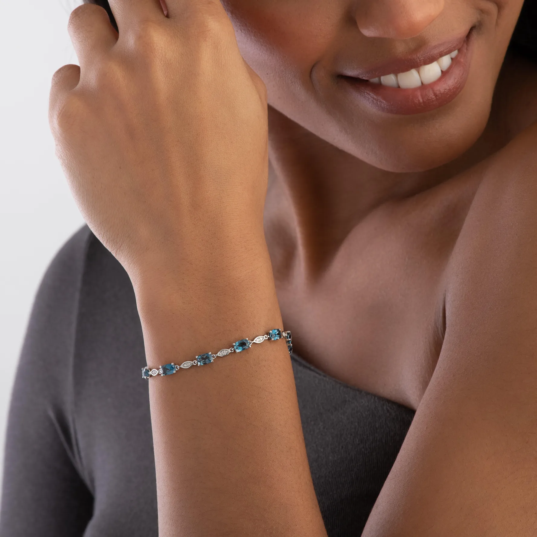 Beaverbrooks 9ct White Gold Diamond Blue Topaz Tennis Bracelet