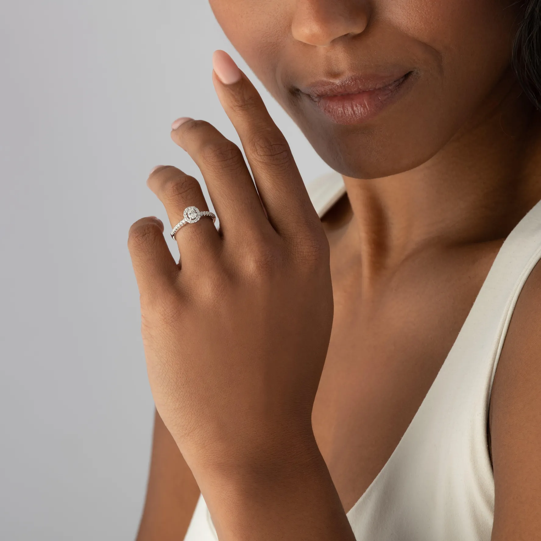 Beaverbrooks 18ct White Gold Diamond Oval Cut Halo Ring