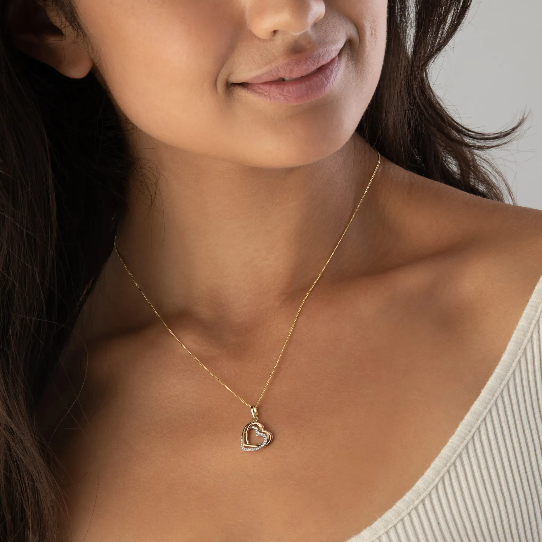 Beaverbrooks 9ct Yellow Gold, White Gold and Rose Gold Cubic Zirconia Heart Pendant