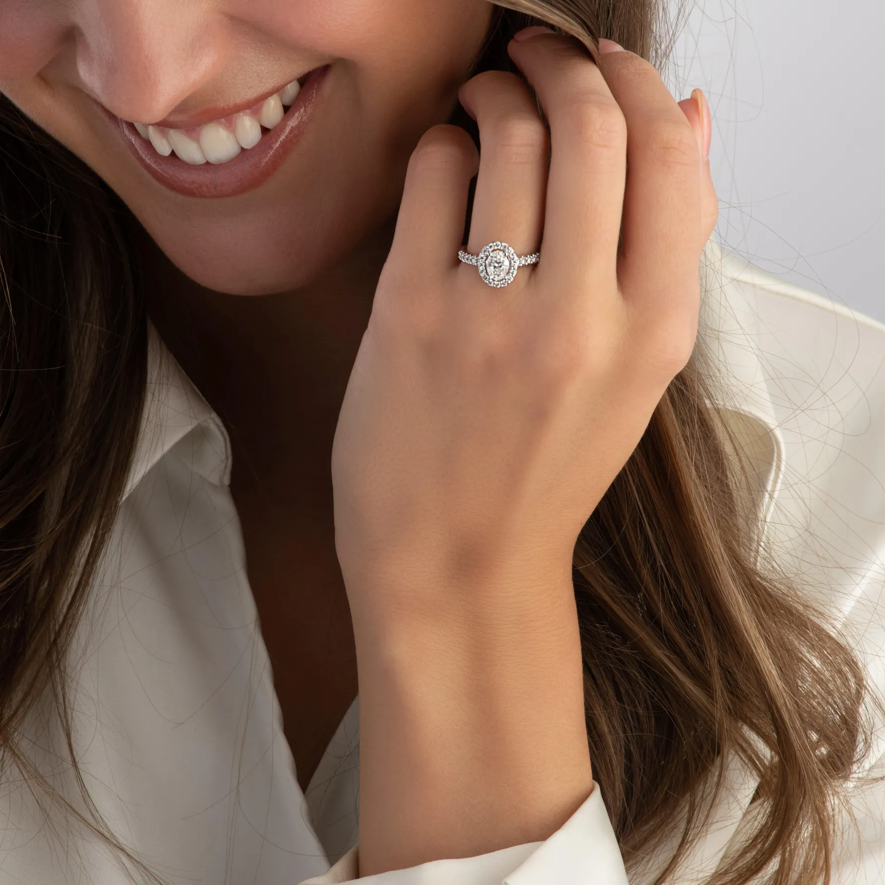 Beaverbrooks Platinum Diamond Oval Cut Halo Ring